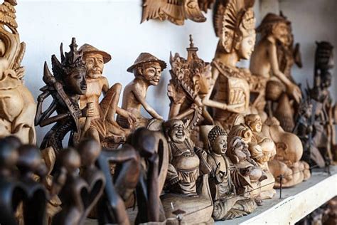 What Tales Does Wooden Wonders: Exploring Traditional Indonesian Wood Sculpture Whisper From Its Pages?